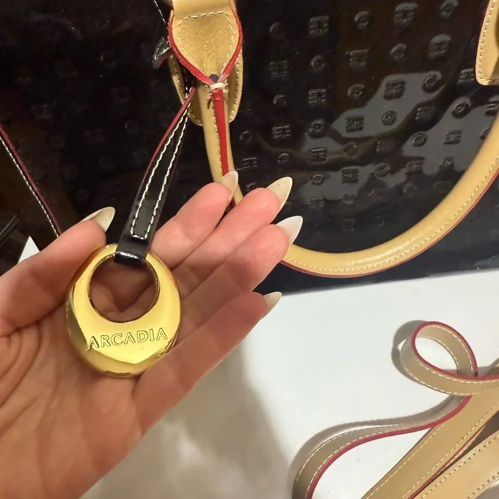 Arcadia Black Patent Leather Crossbody Straps and goldtone tag Black Tote